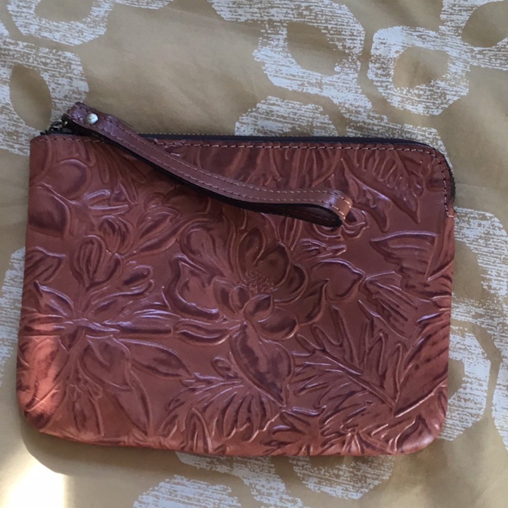 Patricia Nash leather clutch with wrist strap